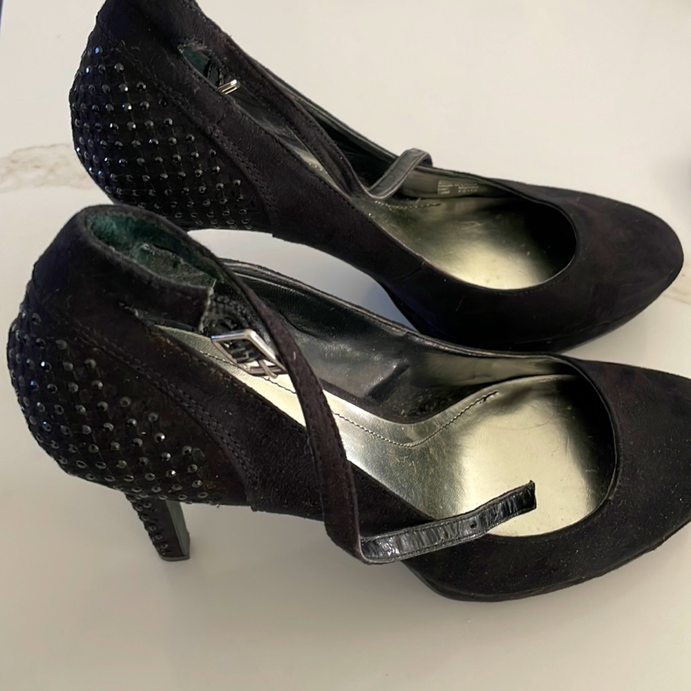 Black suede heels. Worn once.  4.5” heel.